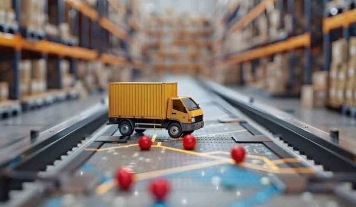 Camión de carga en miniatura sobre una ruta de distribución dentro de un almacén logístico, representación de la logística urbana y la última milla.