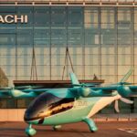 Aeronave eléctrica eVTOL de Eve frente a un edificio de Hitachi