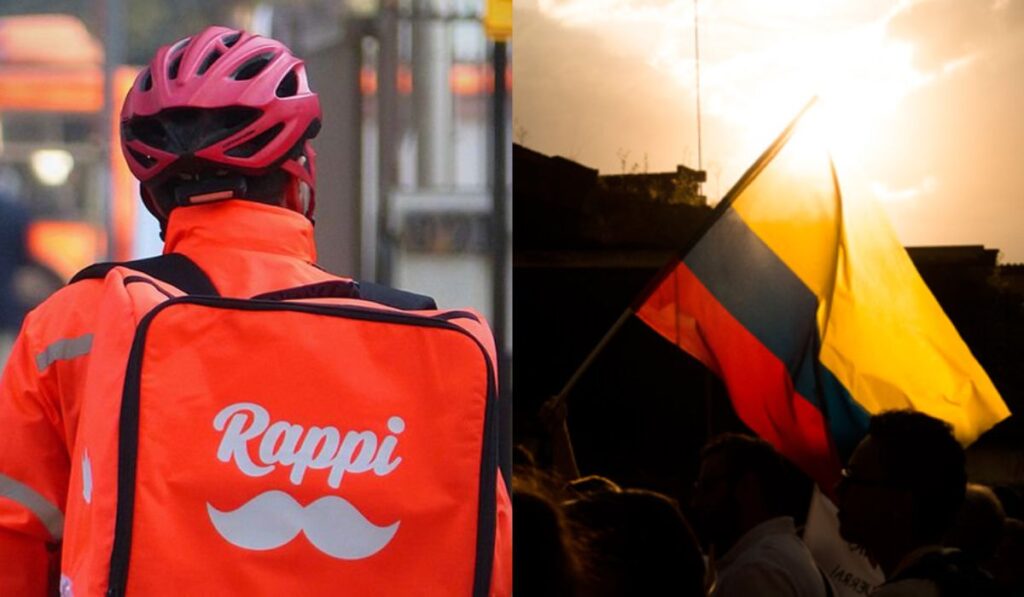 Repartidor de Rappi con mochila naranja junto a la bandera de Colombia iluminada por el sol, en el marco de donaciones por el terremoto.