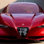 Vista frontal del prototipo deportivo Alfa Romeo CuoreRosso en acabado Liquid Ink Red, mostrando el escudo iluminado y la parrilla Scudetto.